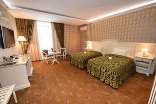 Отель Savoy Кишинёв Стандартный двухместный номер с 2 отдельными кроватями-1